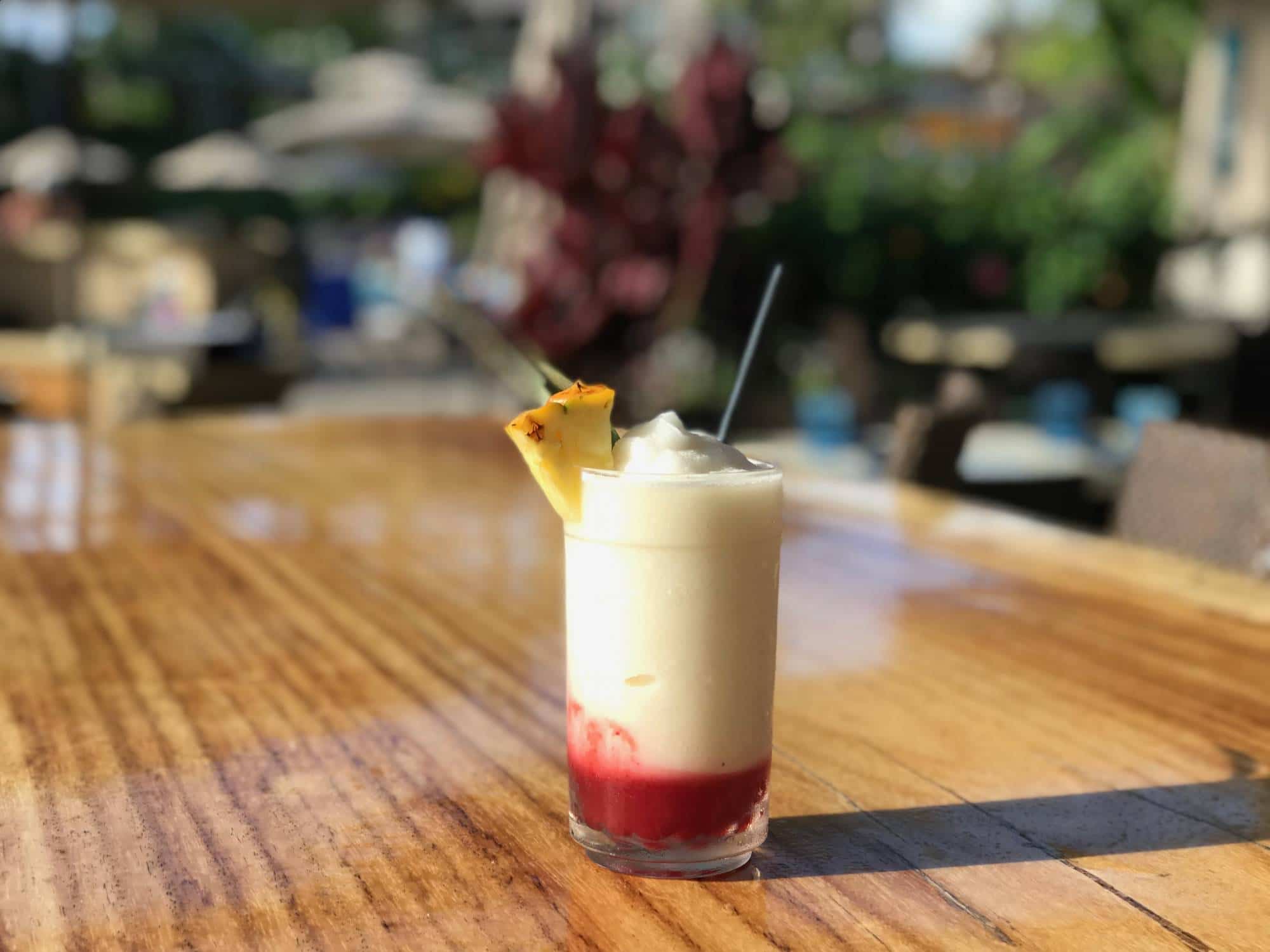 Lava flow cocktail with cream of coconut from popular Hawaiian refreshments on a table.
