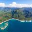 Aerial view of the Hawaiian island of Kauai surrounded by the pacific ocean and where you can see the top rated all inclusive resorts