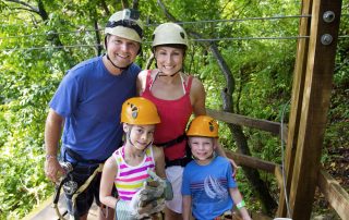 Family enjoying Kauai zipline outdoor adventures