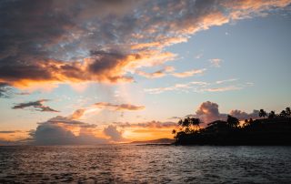 Watch the sunrise and sunset with your whole family at the beach in Kauai Hawaii