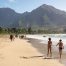 Tourists on one of the best beaches on Kauai.
